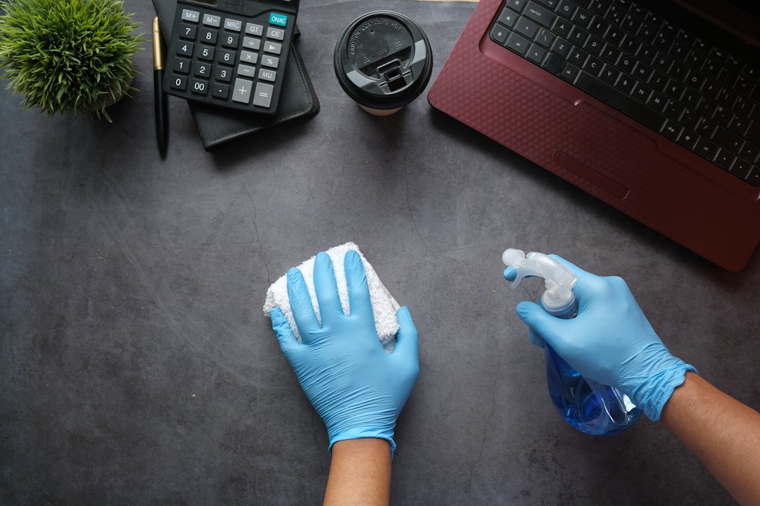 who-we-are person-in-blue-long-sleeve-shirt-sitting-beside-black-laptop-computer-9gpkrsbgmc